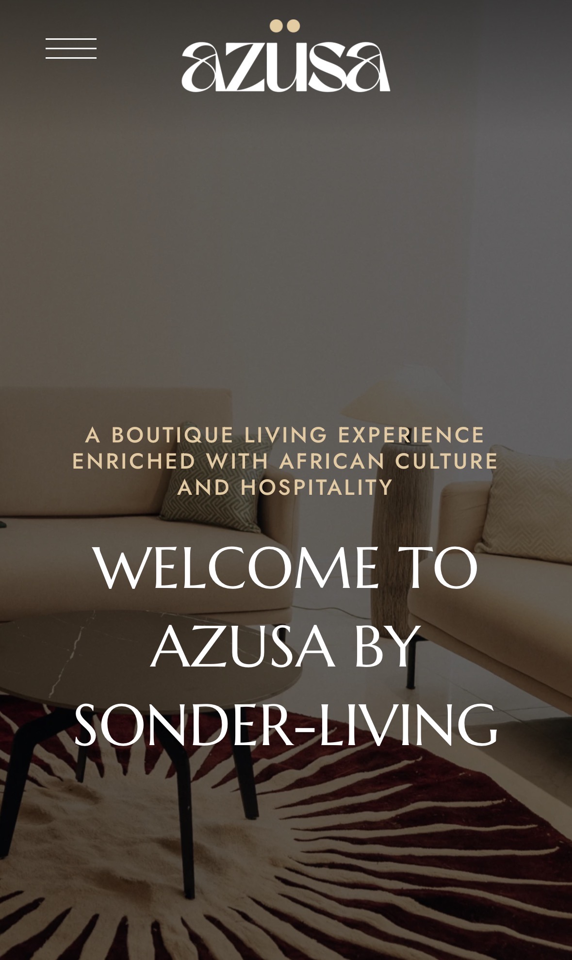 The lounge interior of Azusa Hotel with African-inspired textiles and soft seating