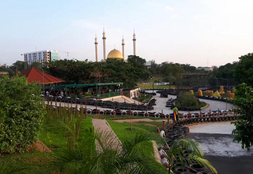 The go-kart track at Center Park with views toward Abuja's National Mosque